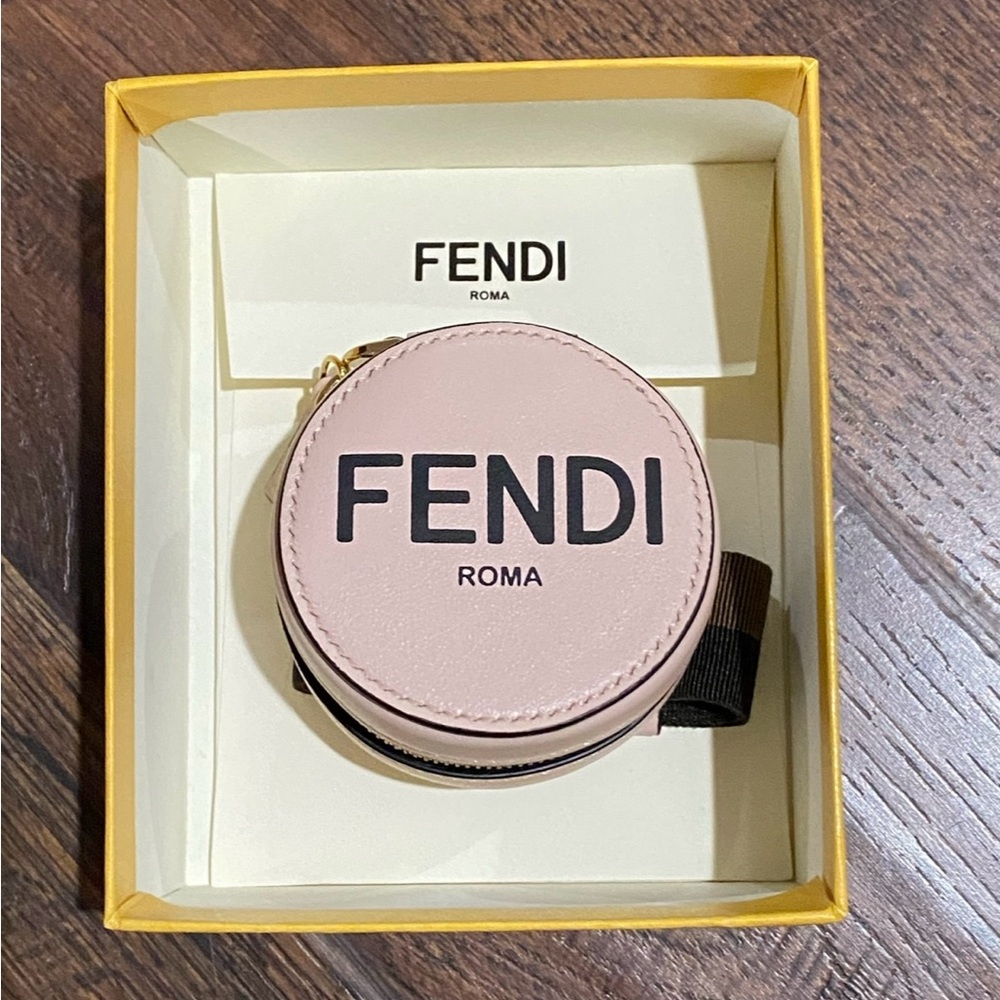 Fendi Pinkish Cream with black and brown strap Round Wristlet